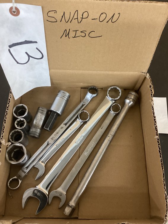 Box of assorted Snap On tools.