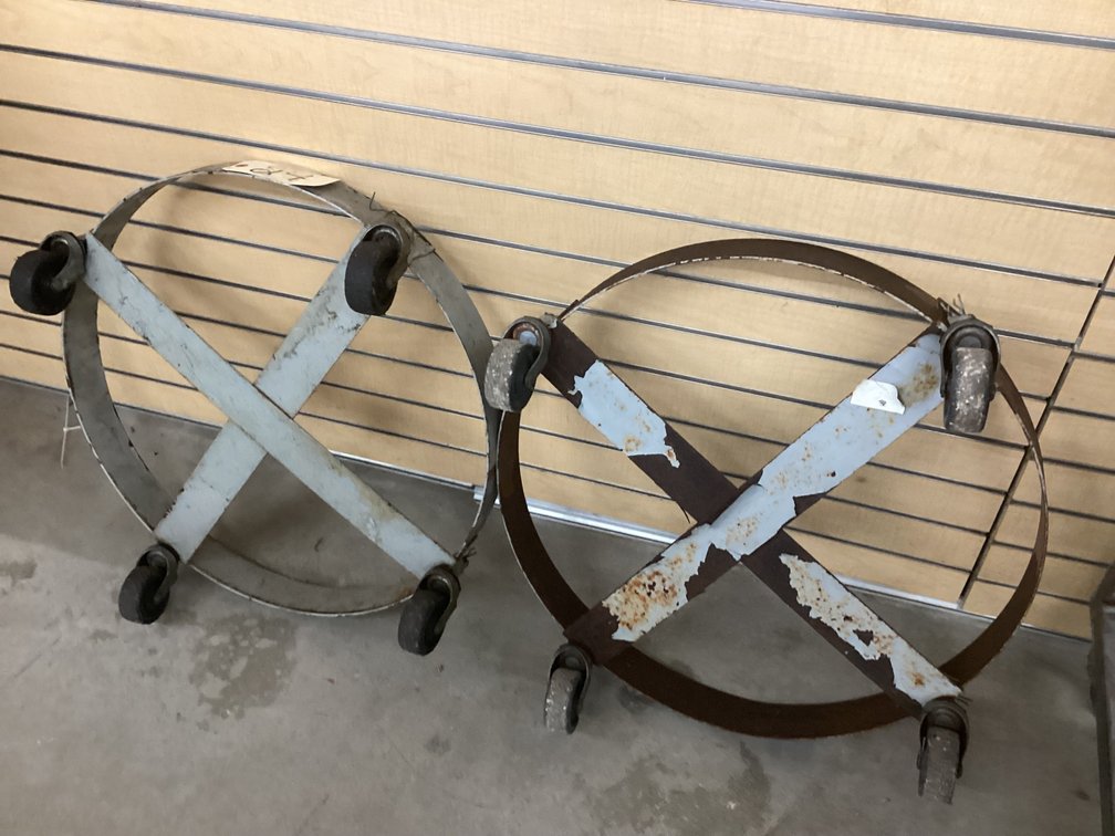 (2) four caster barrel rollers.