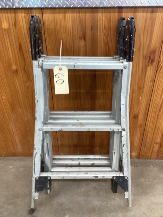 Tri-fold aluminum ladder.