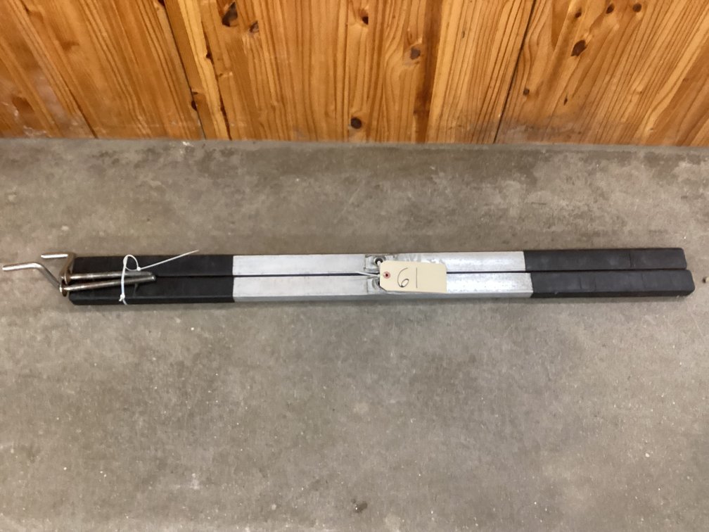 (2) aluminum snowmobile trailer tie down bars w/ cranks.