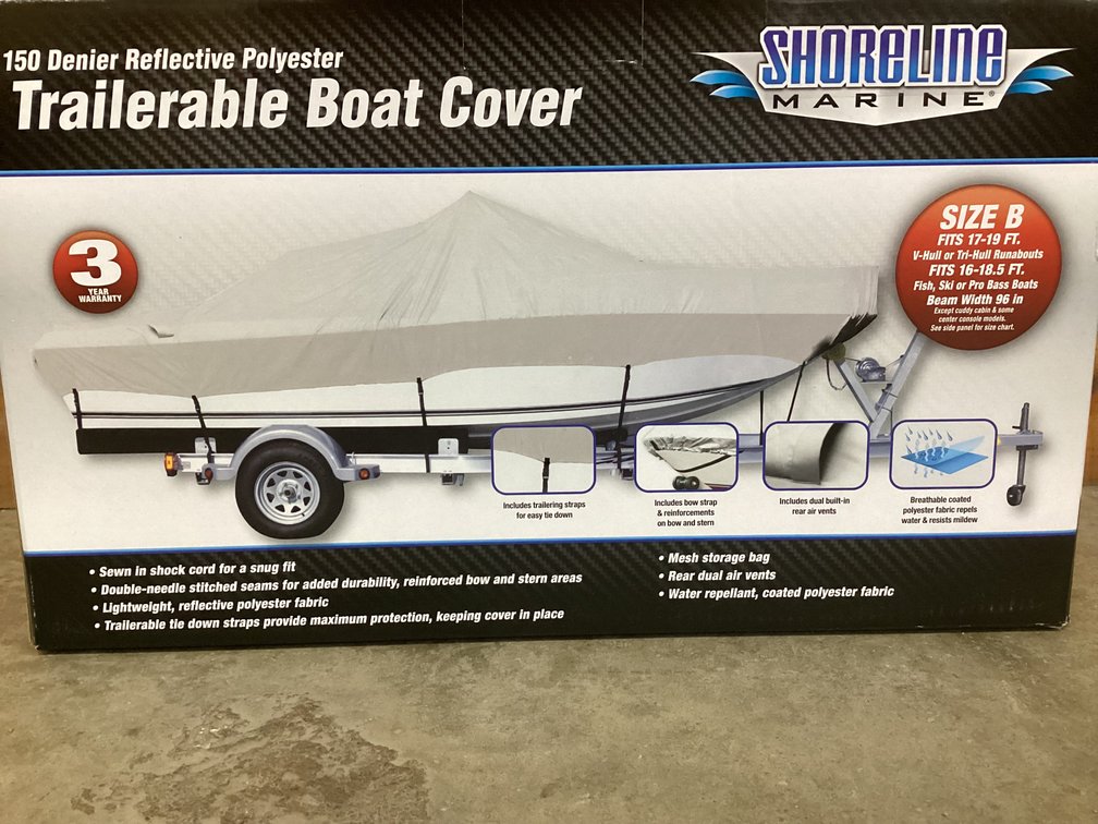 Unused Shoreline Marine Trailerable boat cover.