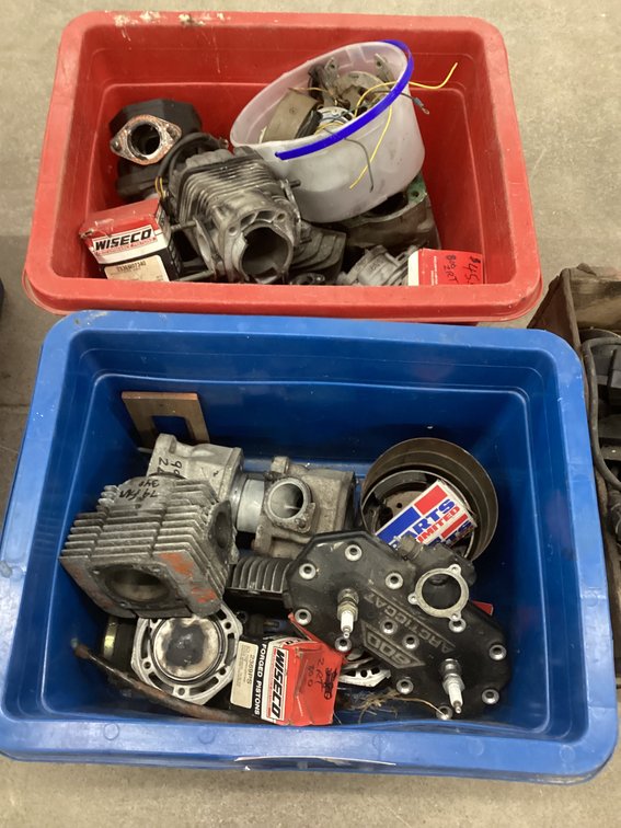 (2) tubs of engine components.