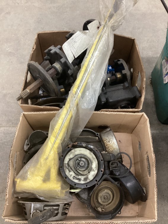 (2) boxes of recoils, drive sprockets, and trailing arm.