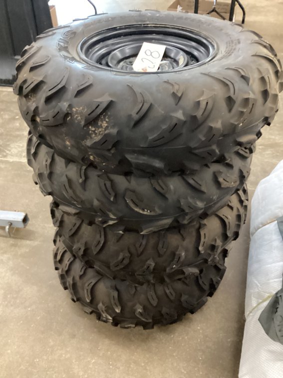Wheels and tires off of a Yamaha Grizzly four wheeler.