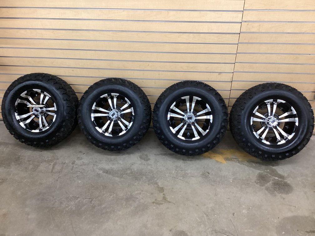 (4) 23X10X12 Pioneer AT Pro tires on aluminum wheels - 4 bolt pattern