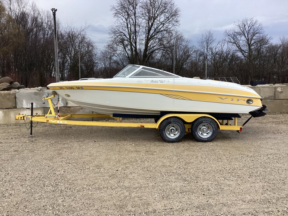 2003 Vivianind 20’ inboard/outboard speed boat, started, title for boat, registration for trailer.