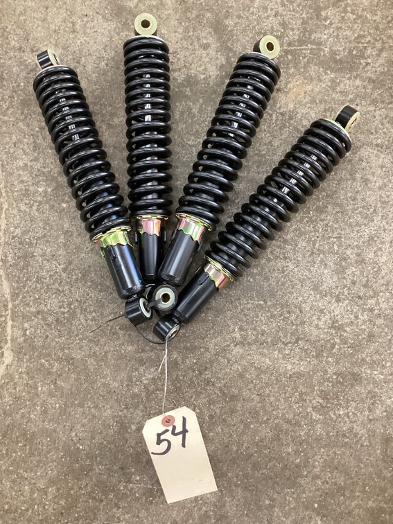 (4) unused coil over shocks 