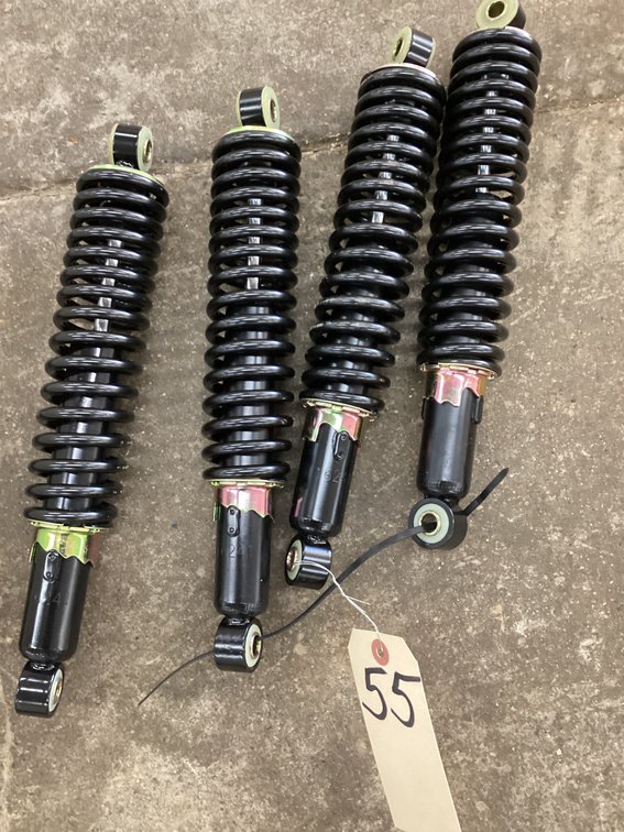 (4) unused coil over shocks 