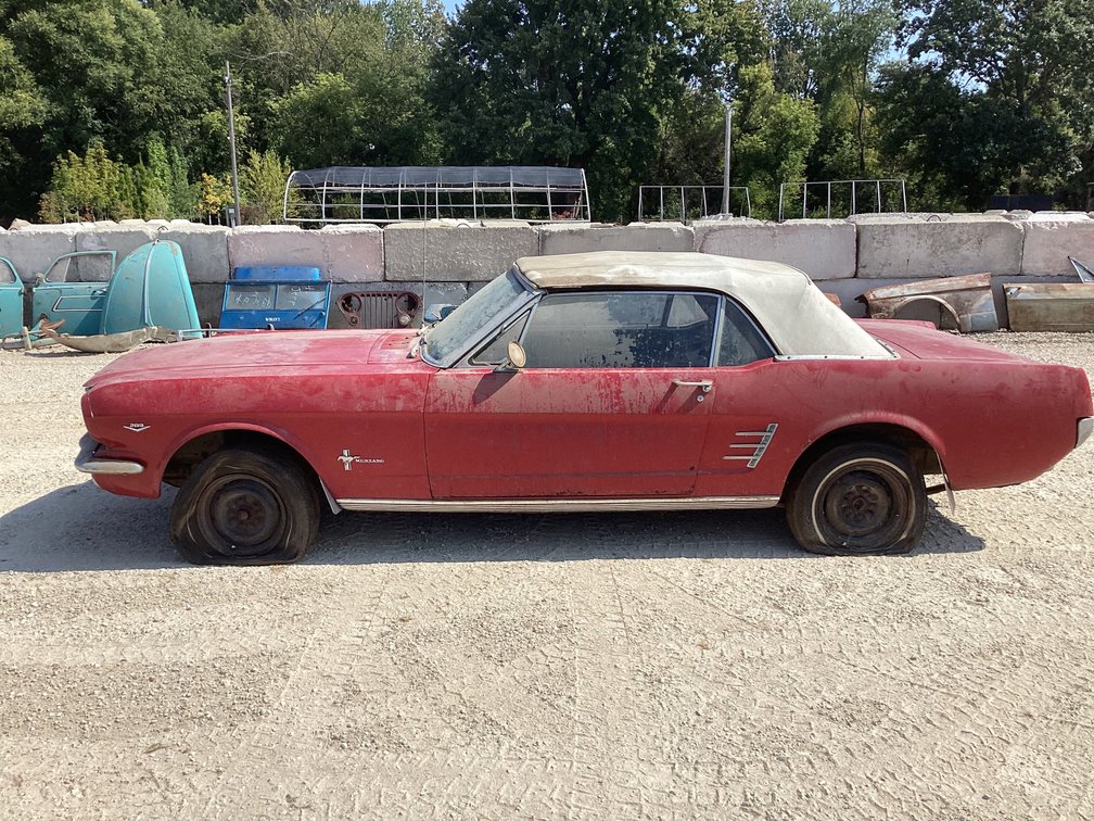 1966 Ford Mustang convertible, odometer shows 52,723, V8, automatic, title.