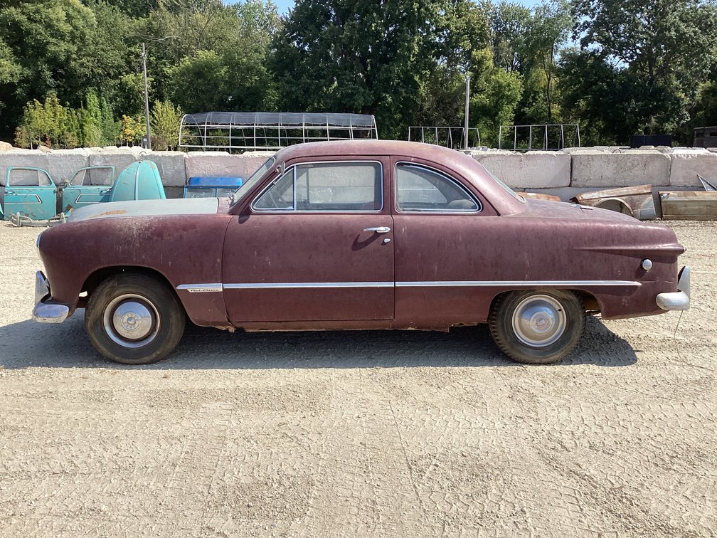 1949 Ford coupe, odometer reads 37,684, flathead V8, title.