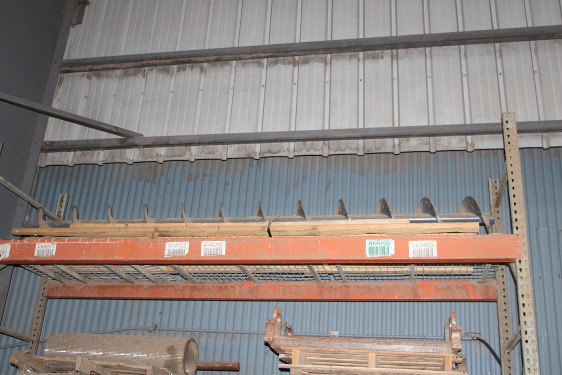 Contents of rack and on the floor (rolls, auger