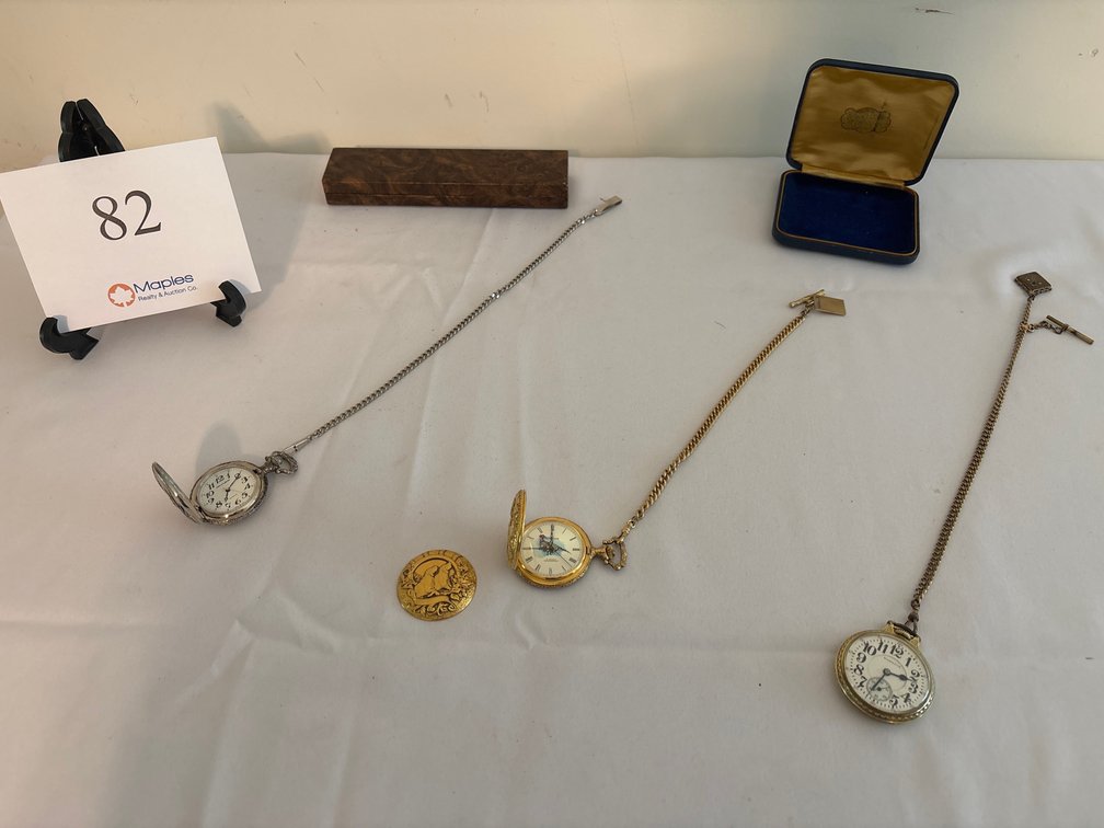THREE POCKET WATCHES ON CHAINS