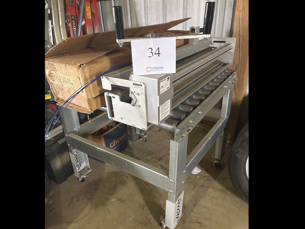 CONVEYER WITH ROLLER LACER CLIPPER AND A LINEAR ACTUATOR