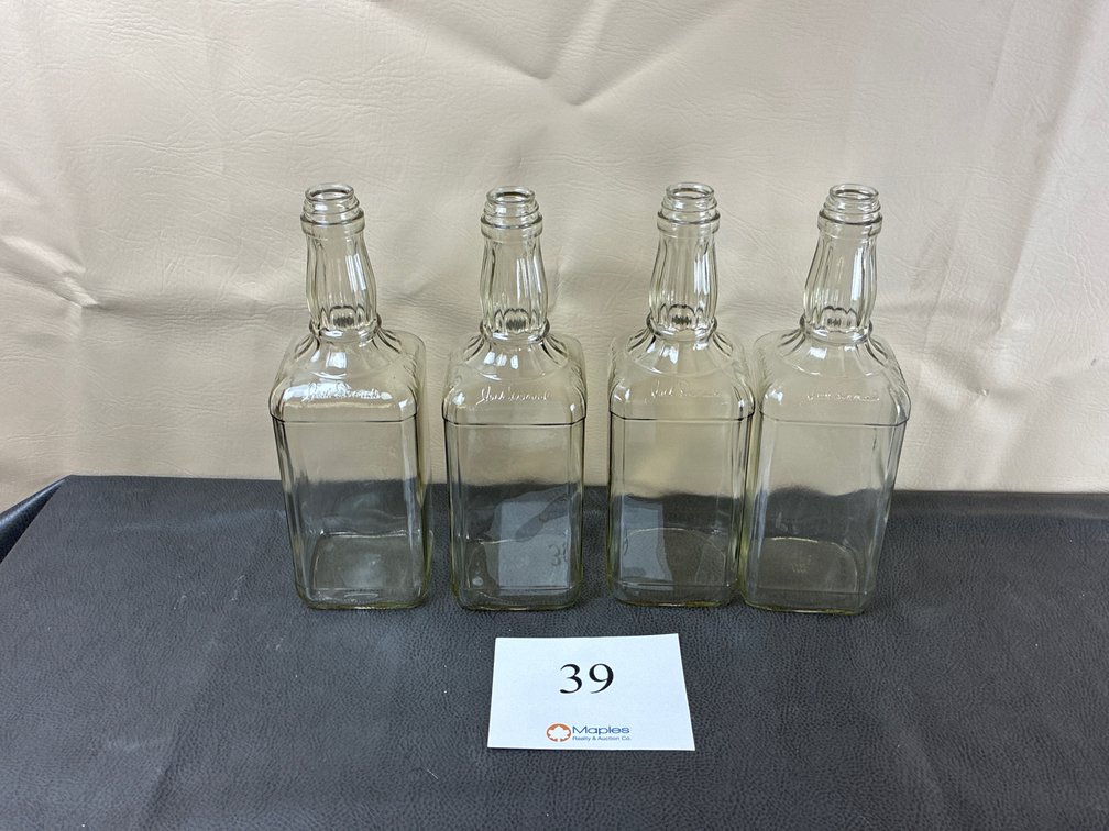 (4) Jack Daniels Whiskey Bottles