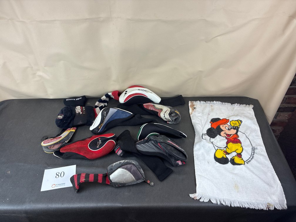 Assortment of Golf Club Head covers and Towel
