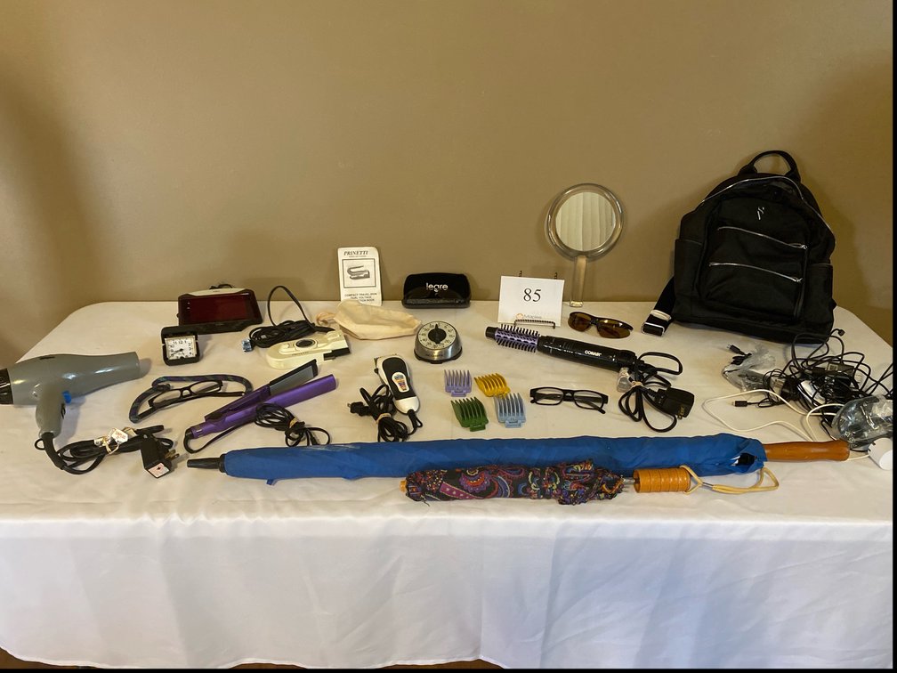 VERA WANG DAY BAG, WAHL CLIPPERS WITH ATTACHMENTS, HAIR DRYER, FLAY IRON, CONAIR CURLING BRUSH, PRINETTI TRAVEL IRON, TRAVEL ALARM CLOCKS, UMBRELLAS, SUNGLASSES, READING GLASSES, MISC POWER CORDS