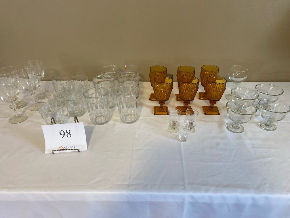 AMBER COLORED WINE GOBLETS , VARIOUS OTHER CLEAR GLASSES 