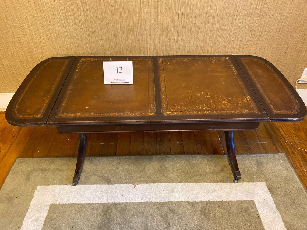 VINTAGE COFFEE TABLE WITH SIDE FOLDS AND WHEELS 