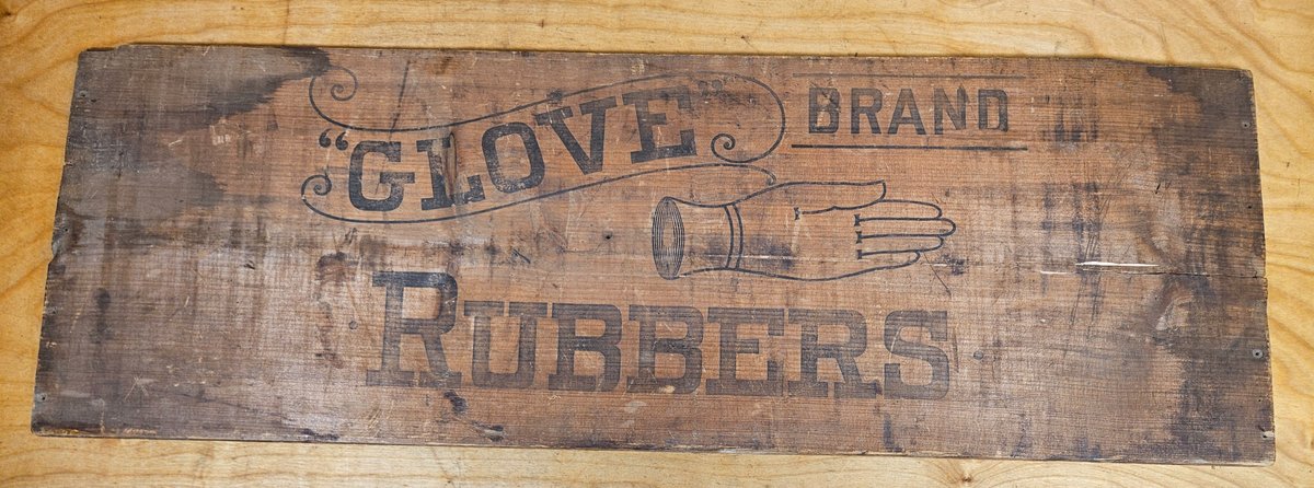 "Glove" Brand Rubbers Sign