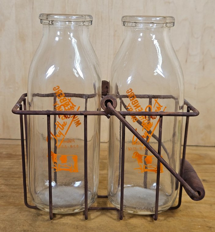 Two Glass Milk Jugs with Metal Carry Basket