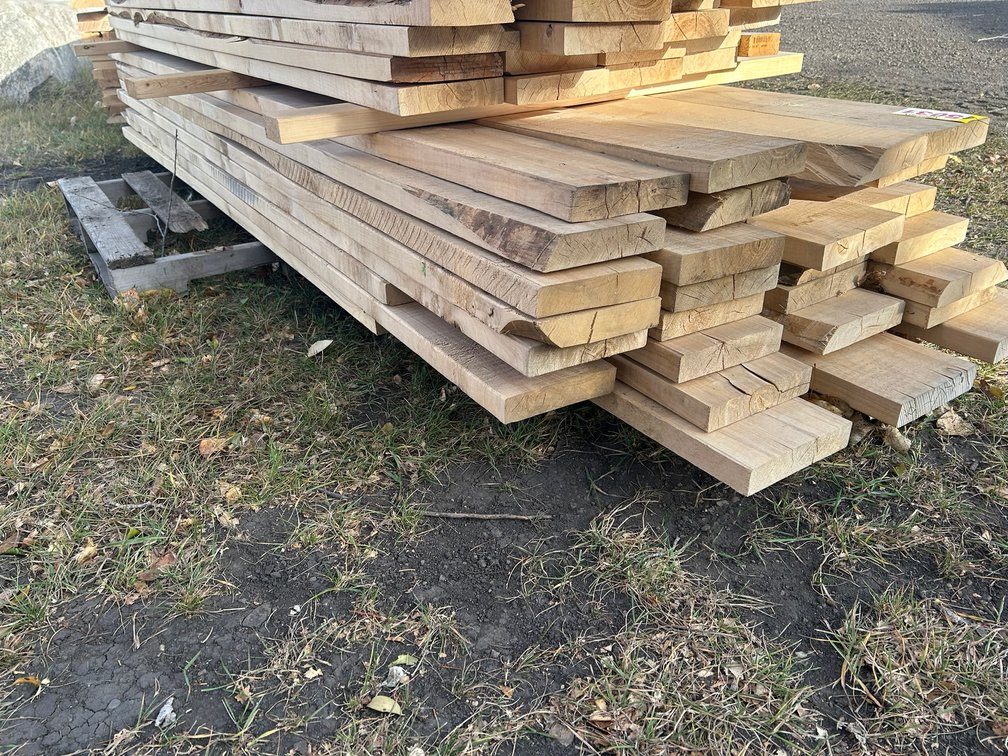 Lift of 2x8x10FT Birch Planks