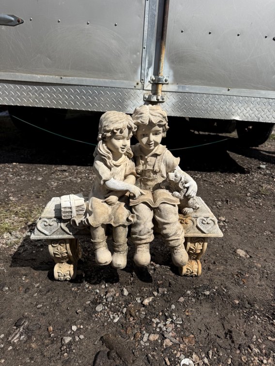 Children Reading on Bench Statue