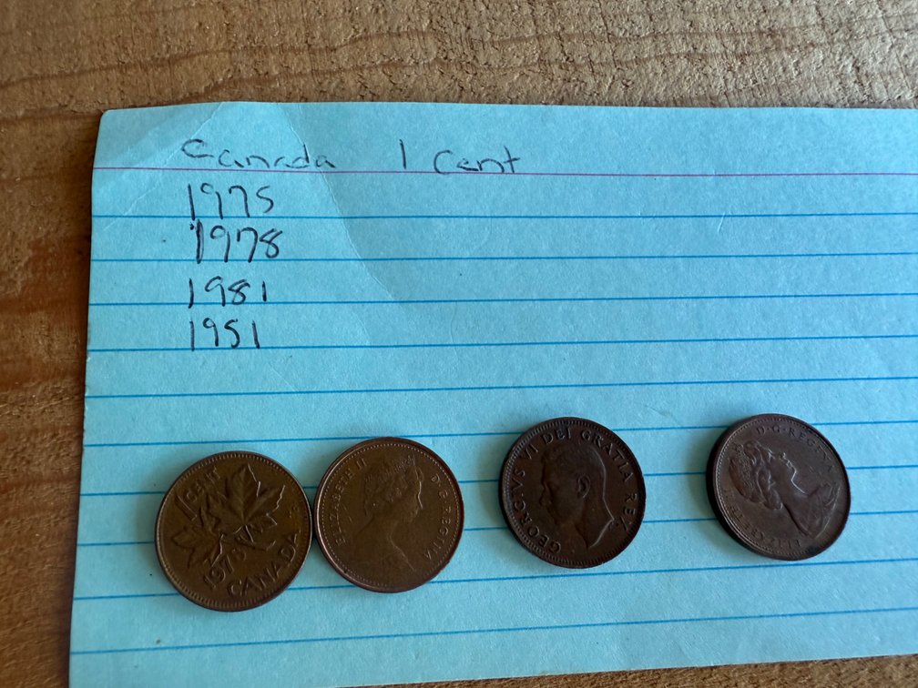 Four Canadian 1-Cent Coins