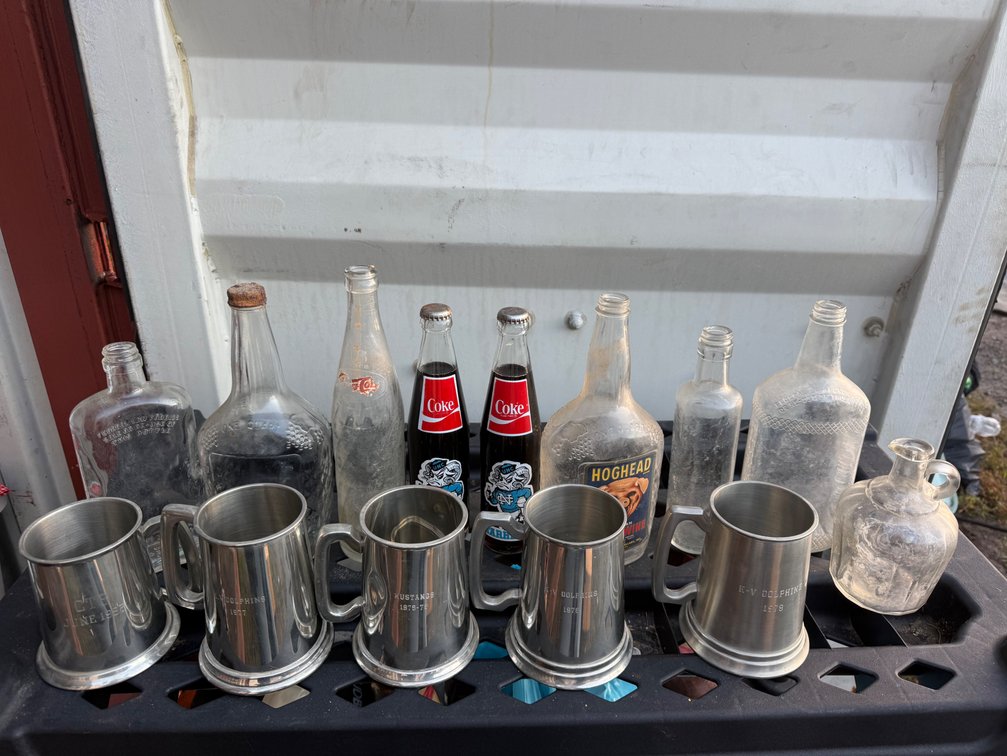 Vintage Glass Bottles and Engraved Metal Tankards