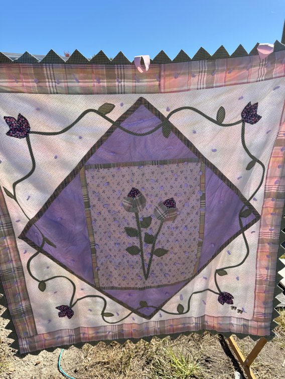 Patchwork Quilted Wall Hanging with Floral Appliqué