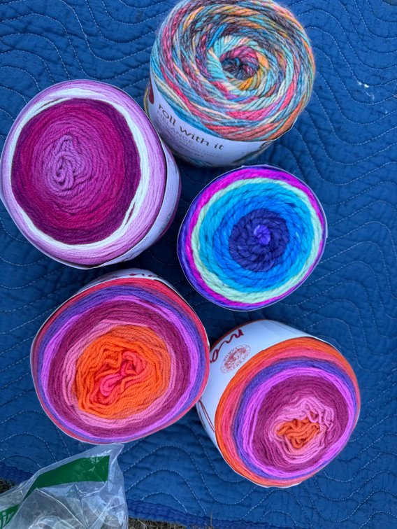 Lion Brand Roll With It Melange and Mandala Yarn Cakes
