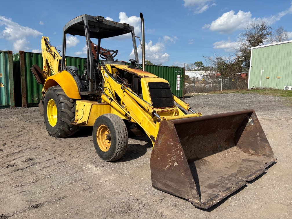 2000 New Holland LB75 2WD Backhoe Loader, 6657 Hours