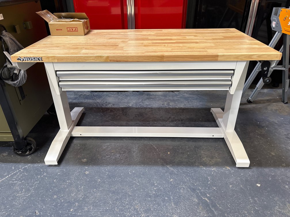 Unused Husky 46in Work Table w/ Adjustable Height and 2 Drawers