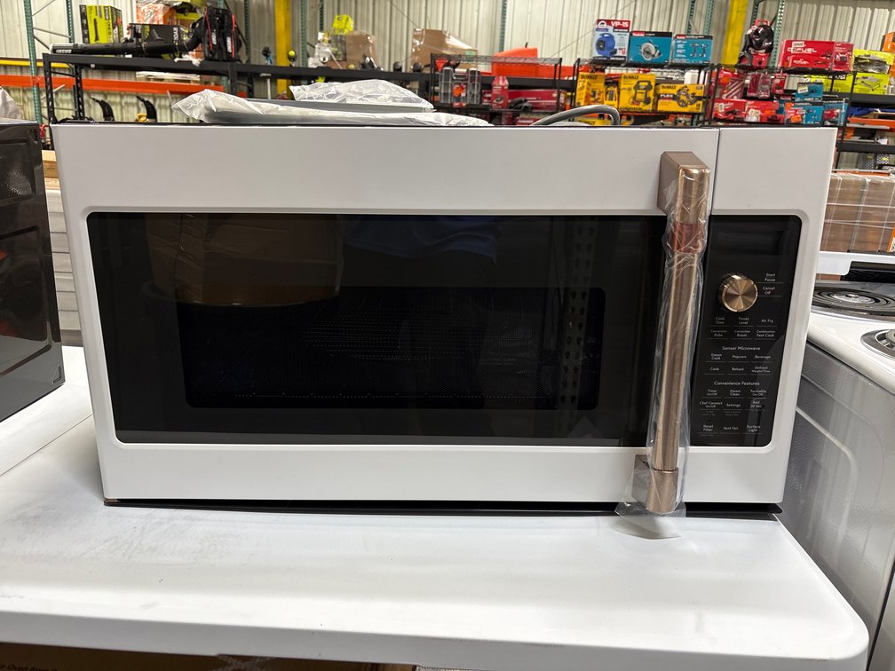 GE Cafe 1.7 Cubic Ft Convection Over the Range Microwave, includes Warranty, model cvm517p4rw2