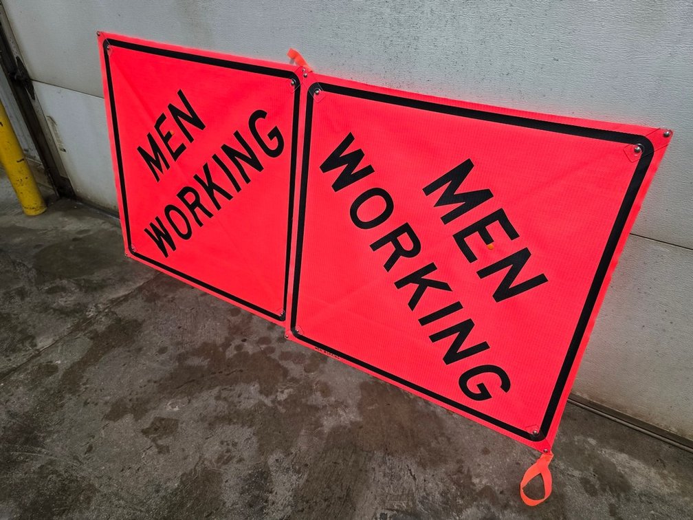 Pair Of "Men Working" Signs