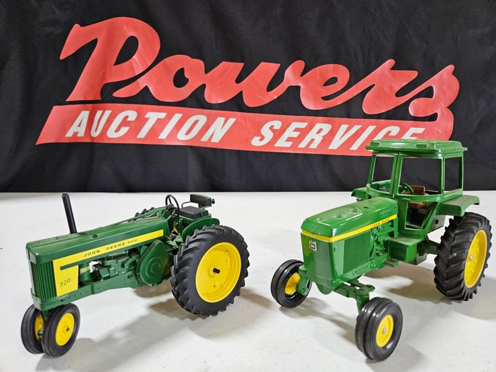 (2) Damaged John Deere Tractors