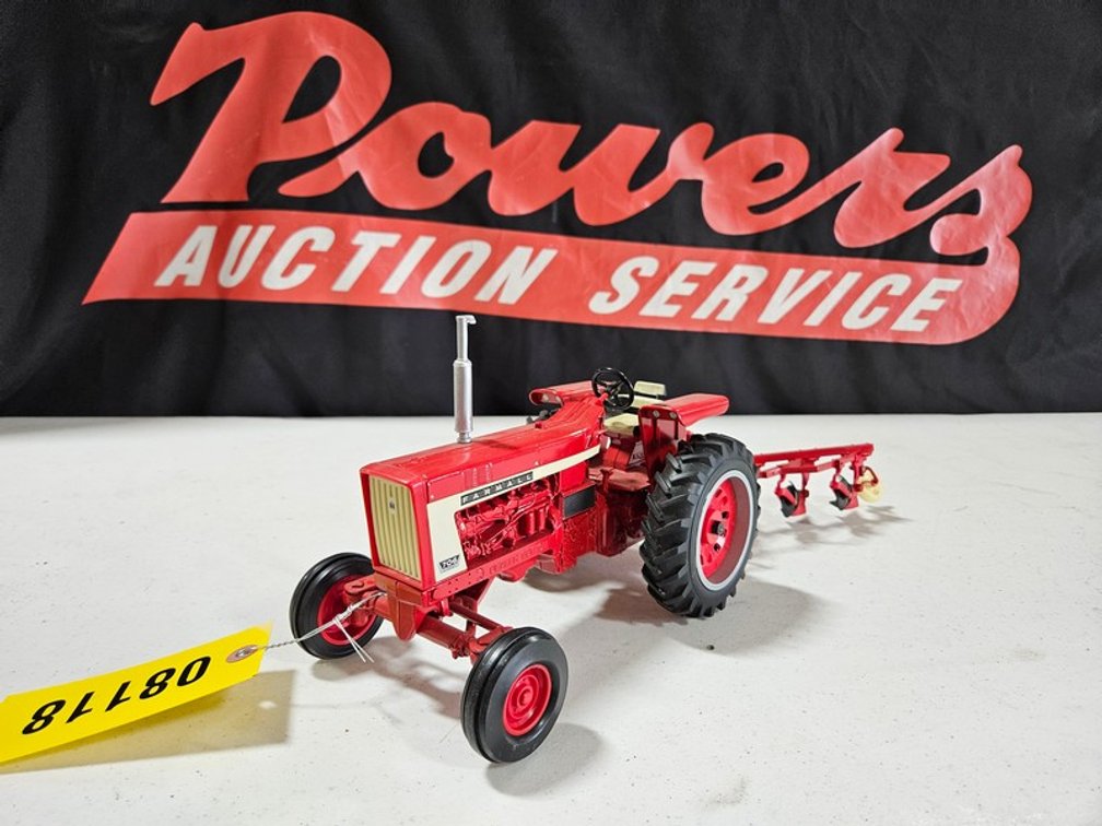 Farmall 706 Tractor And 4 Bottom Plow