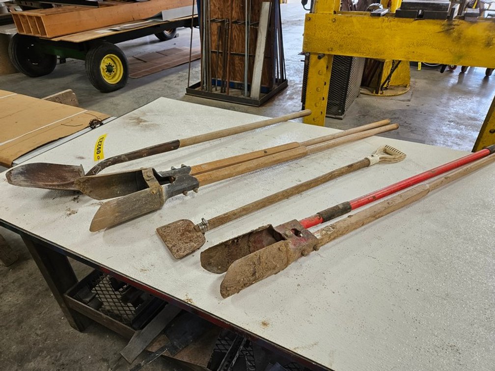 Rack Of Assorted Yard Tools
