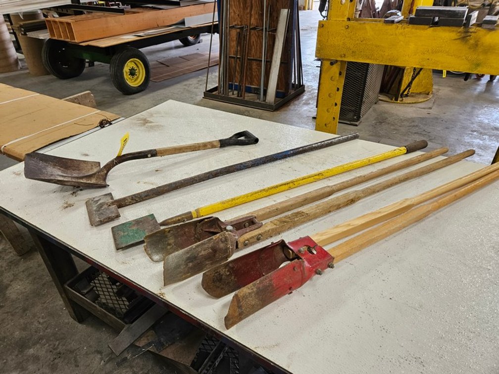 Rack Of Assorted Yard Tools