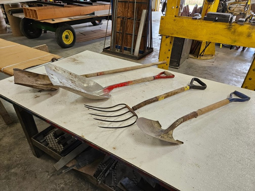 Rack Of Assorted Yard Tools