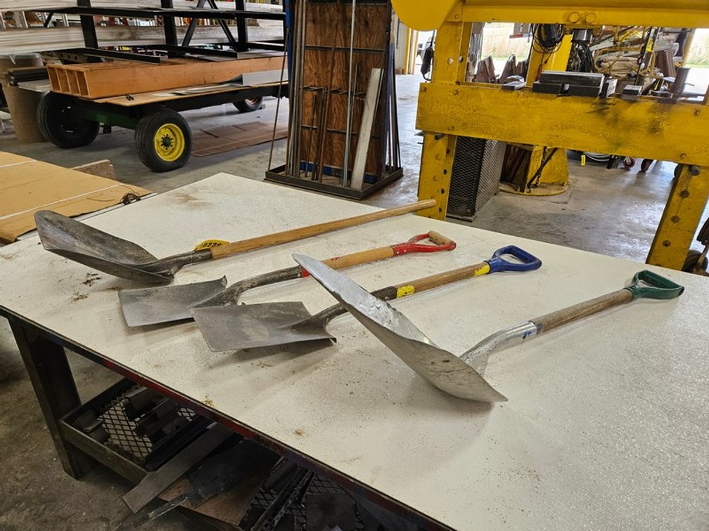 Rack Of Assorted Shovels