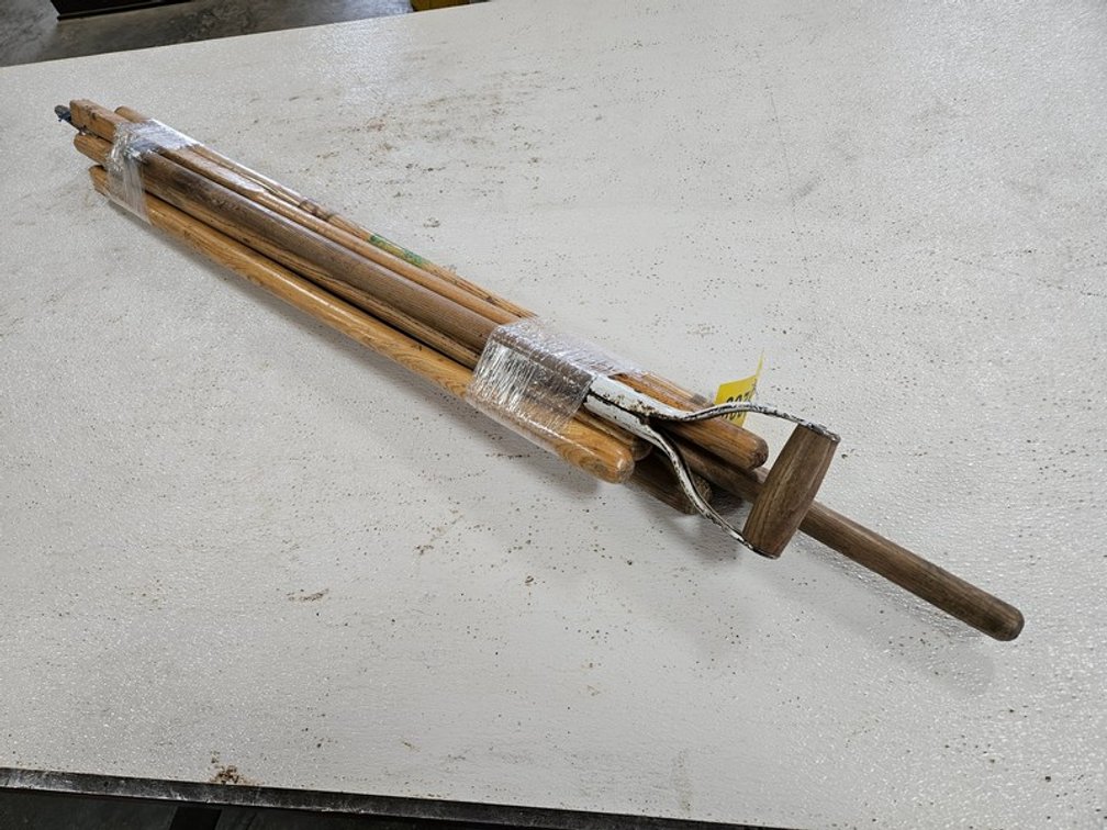 Bundle Of Wood Shovel And Broom Handles