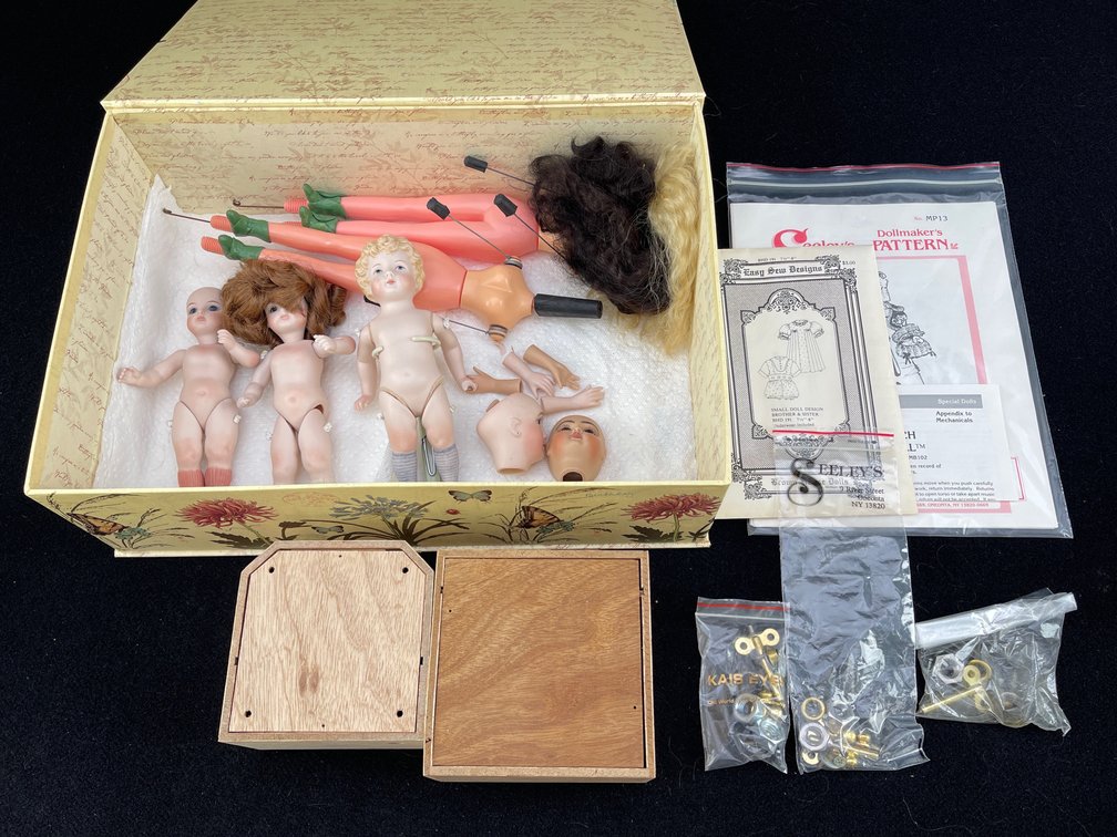Porcelain Dolls, Accessories, and Music Boxes