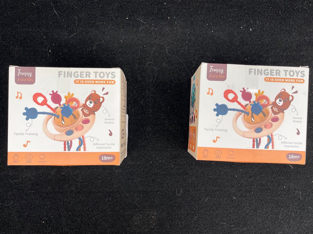 2 Boxes of Finger Toys