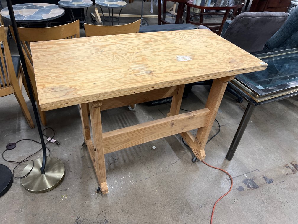 Wooden Utility Table with Rolling Caster Wheels.