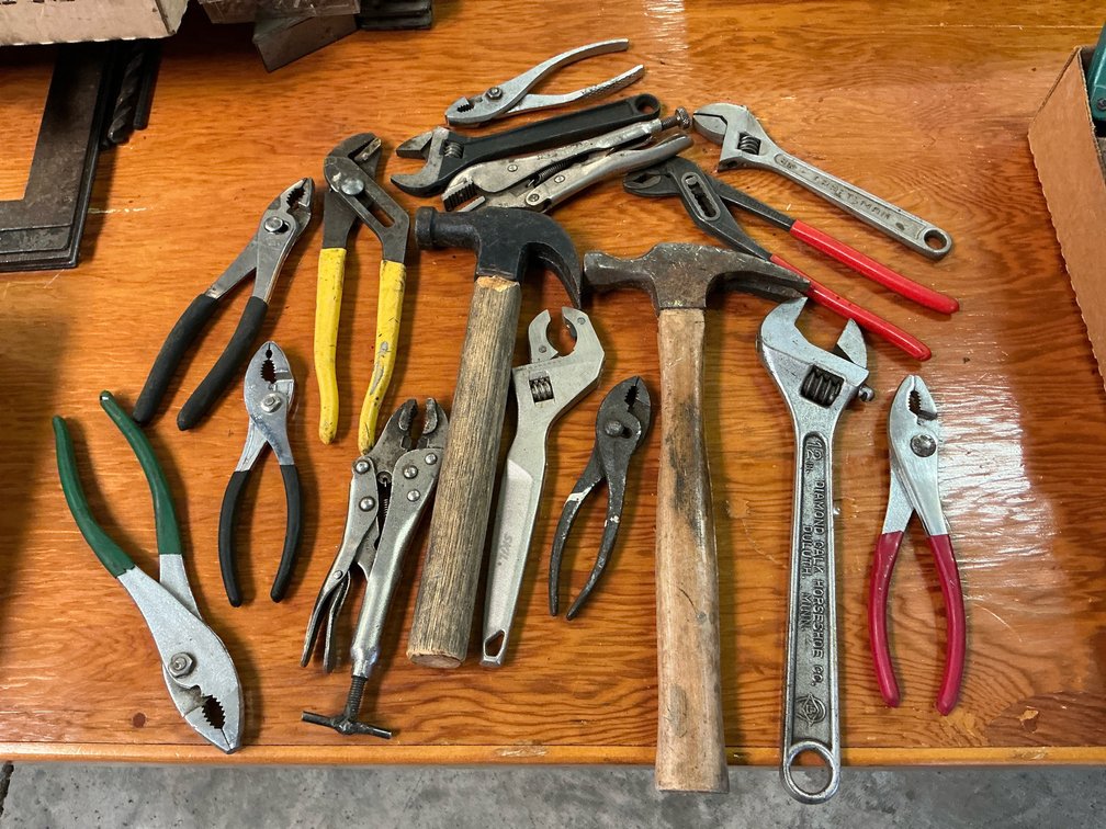 Hammer, crescent wrench, pliers plus more