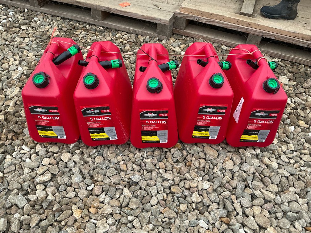 New 5 gal gas cans