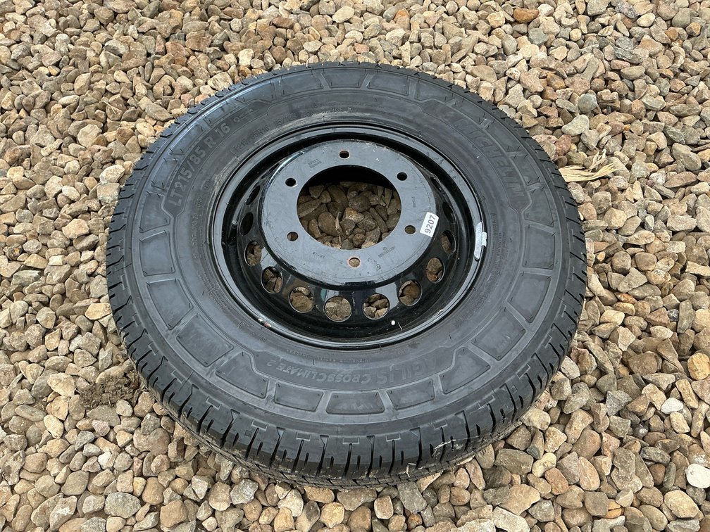 New Michelin 215/85R16 tire on New 6 bolt dually rim