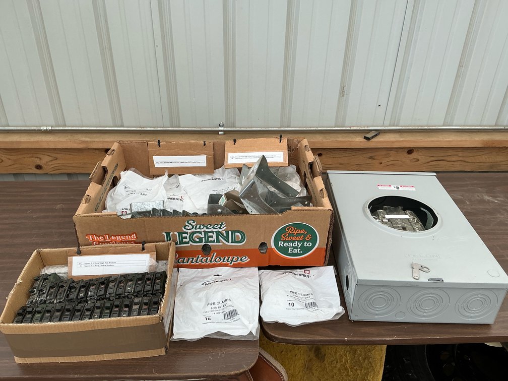 Power Strut EMT conduit straps 1/2", 3/4", 1"; 27 sq D20 amp single pole breakers & (2) sq D 15 amp tandem brakers, 200 Amp meter socket