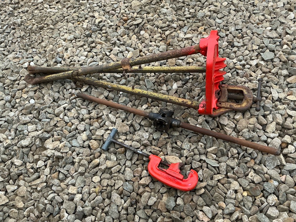 Ridgid pipe stand, pipe cutter, and pipe threader