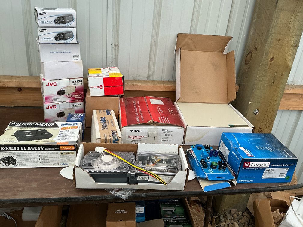 Cameras, mounts, circuit breakers, power strip, transformer